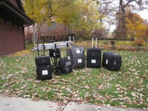 Bringing in the supplies - lots of luggage and items to transport.