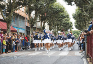 The drum major leads the way for the Helsingør Pigegarde from Denmark.