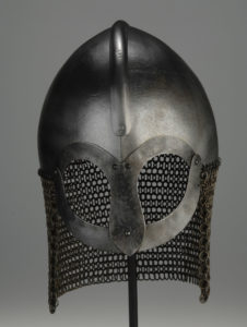 HELMET REPLICA: Finds of Viking helmets are very rare—even in Scandinavia—and none show any evidence of having horns. Though some depictions show men dancing or running in what look like helmets with horns, a closer look reveals the “horns” are actually bird heads. Such headgear was probably for ceremonial use, not battle. © Swedish History Museum (Photo courtesy of The Field Museum) 